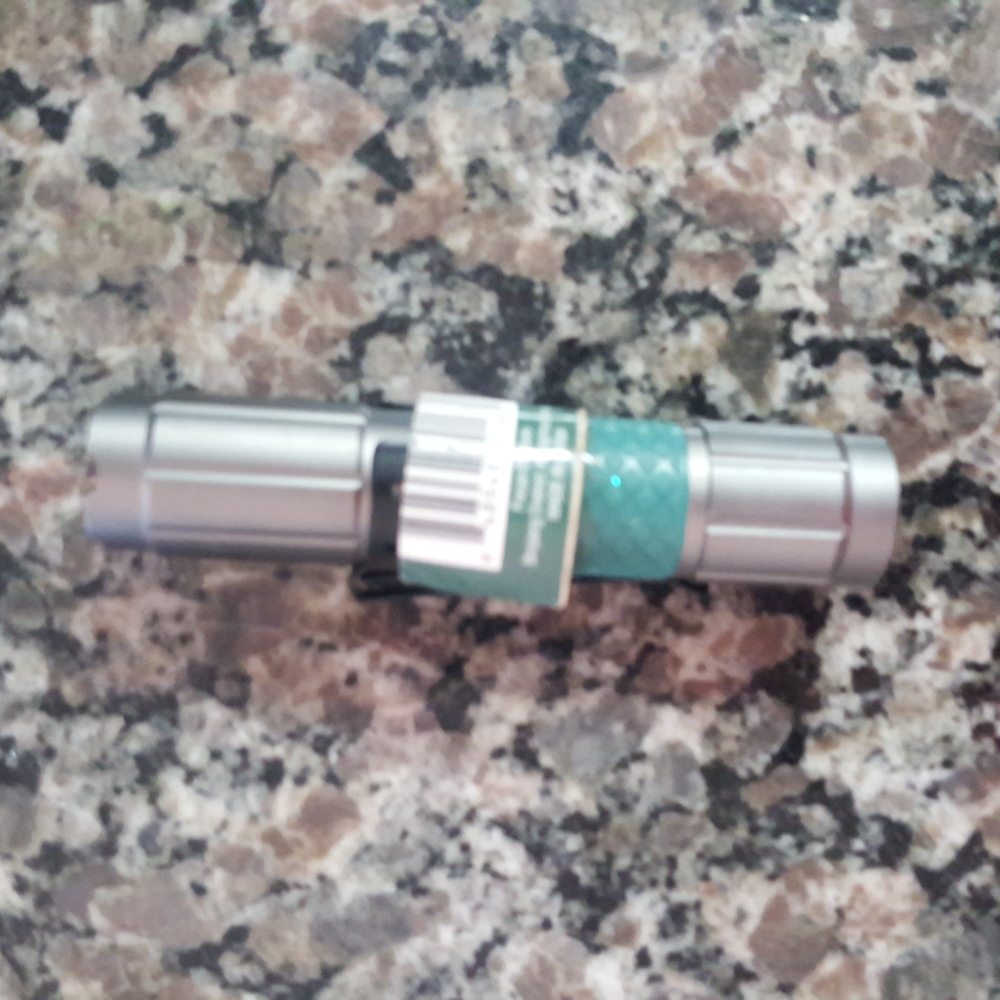 LED POcket flashlight with pocket clip new w tag length 3.75 in
